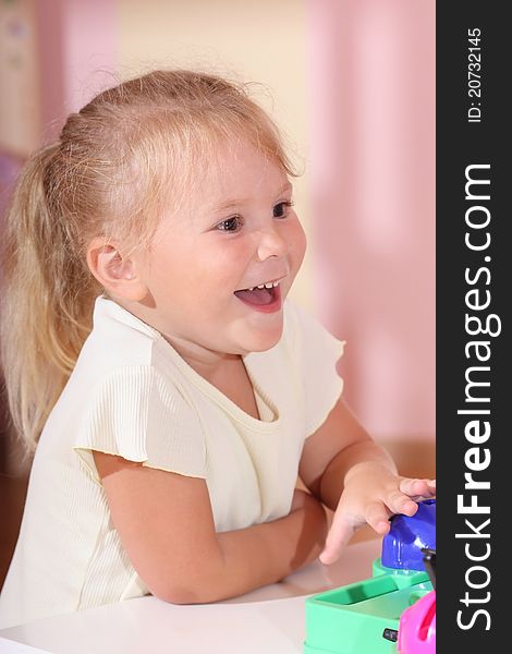 Girl playing a board game