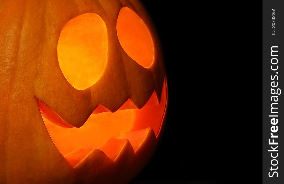 Smiling Jack-o Lantern carved for Halloween night. Smiling Jack-o Lantern carved for Halloween night.