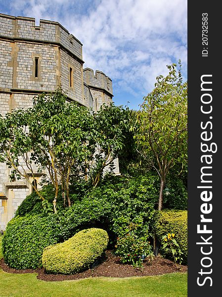 Eastern side of Royal Windsor Castle in England with formal garden area. Eastern side of Royal Windsor Castle in England with formal garden area
