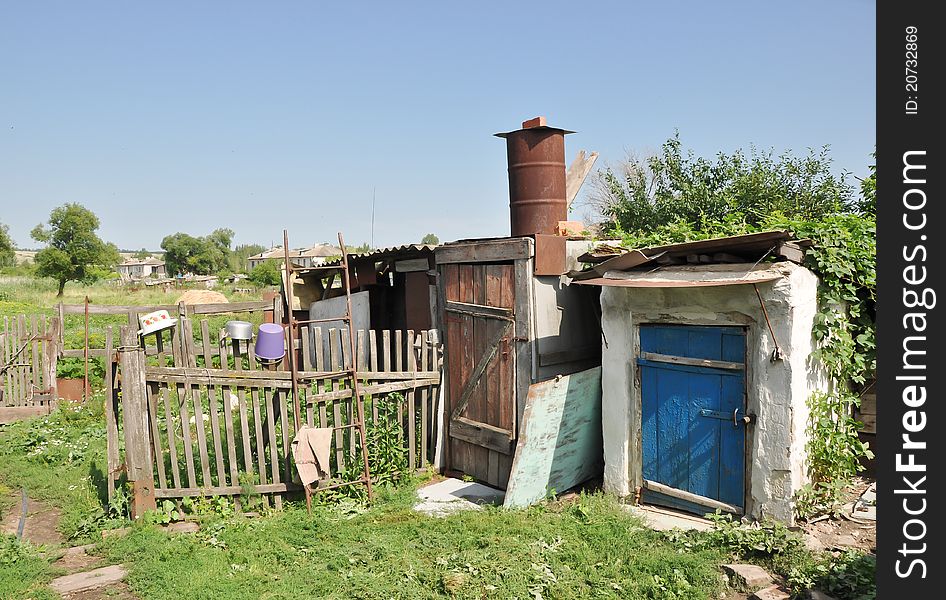 A foto of rural life with pieces of home-related items, such as shower and cellar. A foto of rural life with pieces of home-related items, such as shower and cellar.