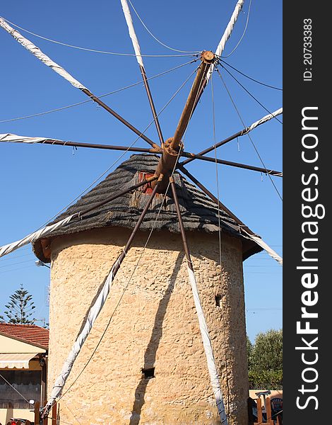 Ancient mill in Hersonissos town, Crete, Greece