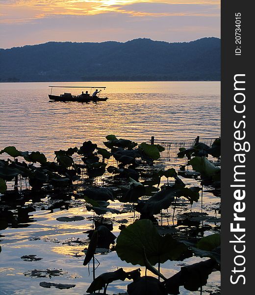 Fishing boat in Hangzhou West Lake, China. Fishing boat in Hangzhou West Lake, China