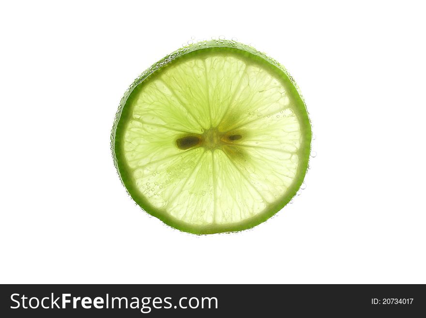 Lime with bubbles isolated on white background