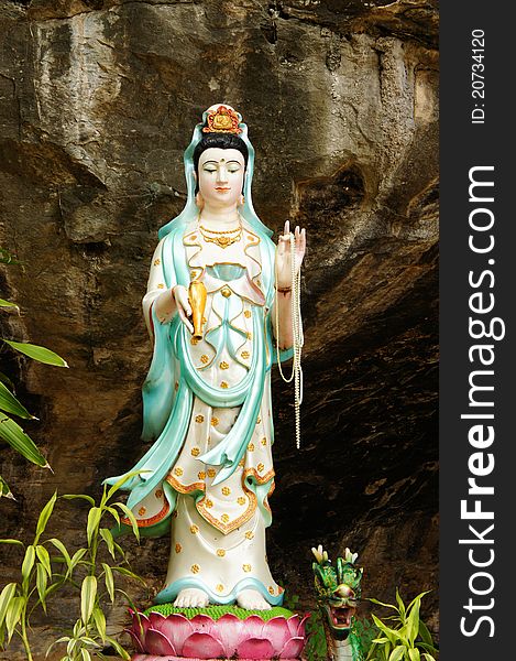 Picture of a statue of Kuan Yin, Goddess of Mercy. Picture of a statue of Kuan Yin, Goddess of Mercy