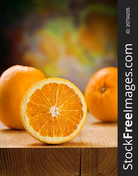 Studio shot of oranges on wooden boards