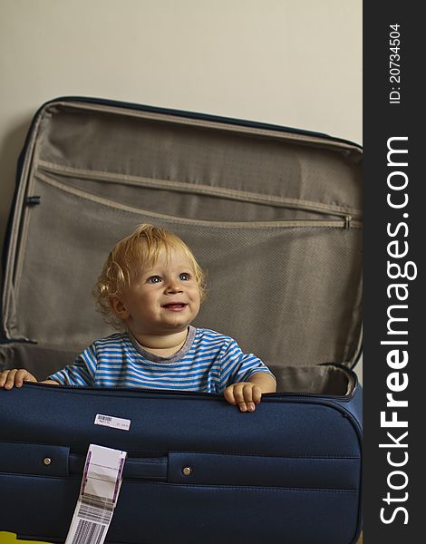 Baby in the suitcase, family travel