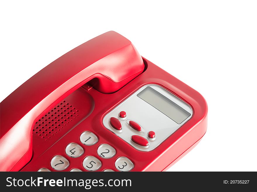 Closeup of red telephone on white background. Isolated with clipping path