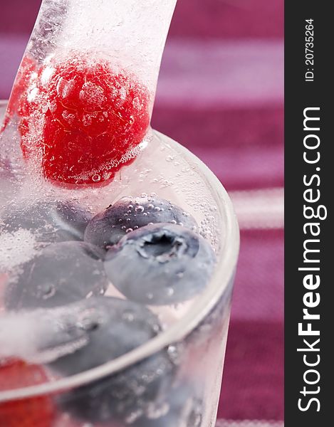 Raspberry And Blackberry Frozen In Ice