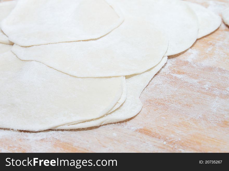 Cooking Dumplings with white paste and flour. Cooking Dumplings with white paste and flour.