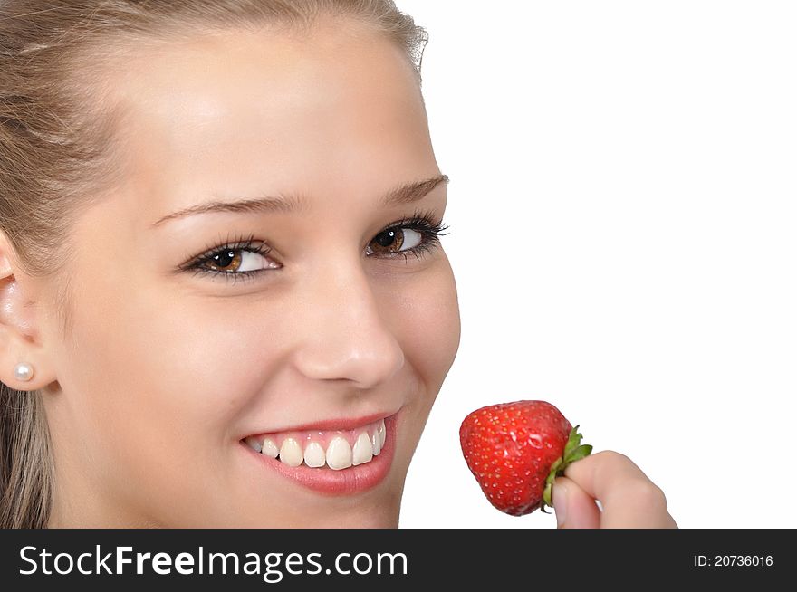 Young Woman Holding A Red Strawberry