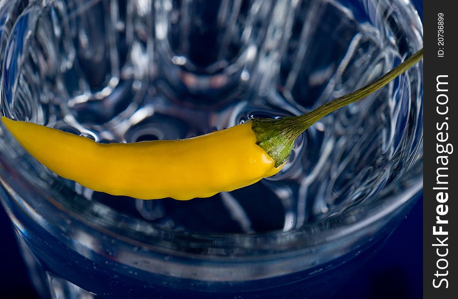 Yellow chili pepper in the water