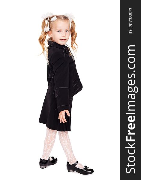 Nice little girl in a school uniform