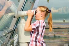 A Girl Looks Through A Telescope Stock Images A Girl Looks Through A Telescope Stock Images