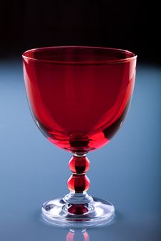 Red Glass On The Blue Glass Table Stock Images