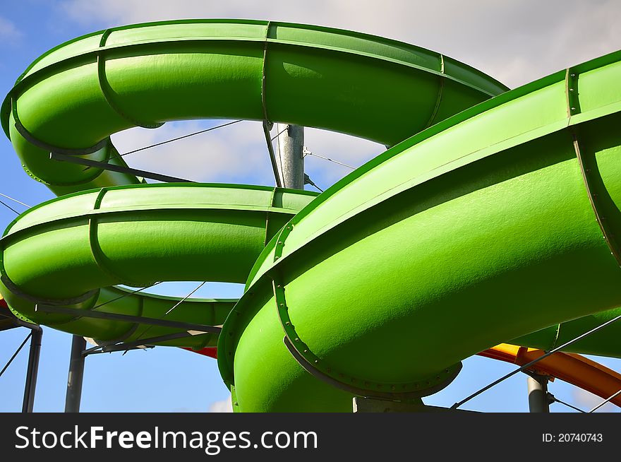 Green pipes in aquapark in center of city Ventspils