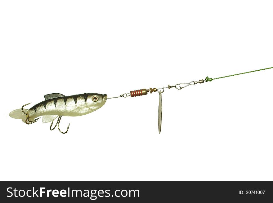 Gum and metal angling bait on white background