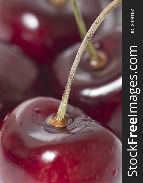 Macro fresh cherry and water drop