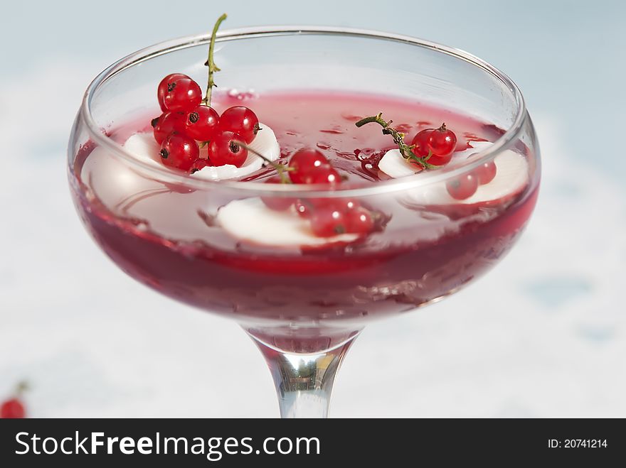 Red currant preserve in glass at white background. Red currant preserve in glass at white background