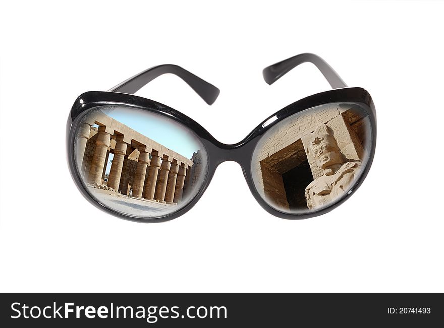 Monuments of Egypt are reflected in dark glasses. Monuments of Egypt are reflected in dark glasses