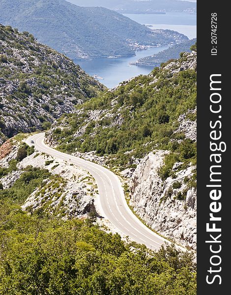 Aerial view on hairpin road to Risan. Montenegro. In background bay of Kotor. Aerial view on hairpin road to Risan. Montenegro. In background bay of Kotor.