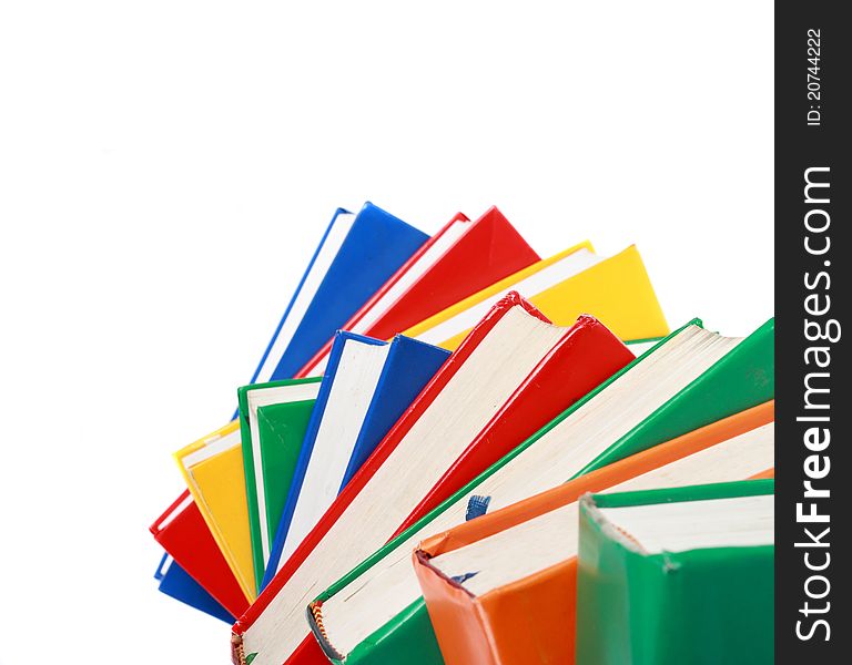 Pile of colorful books isolated on a white background. Pile of colorful books isolated on a white background