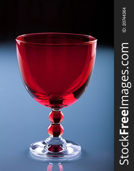 Food shooting Red glass on the blue glass table