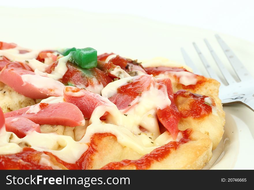 Pizza with fork on white background