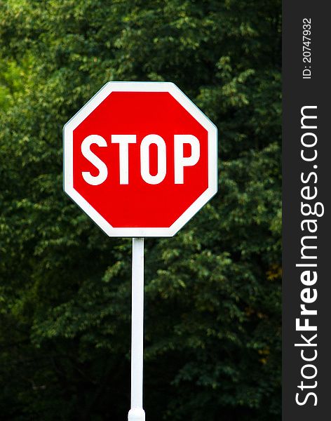 Roadside red stop sign in outdoor