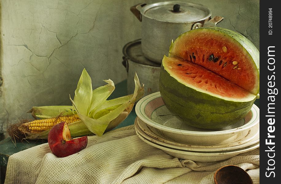 Cut water-melon and apple on a table