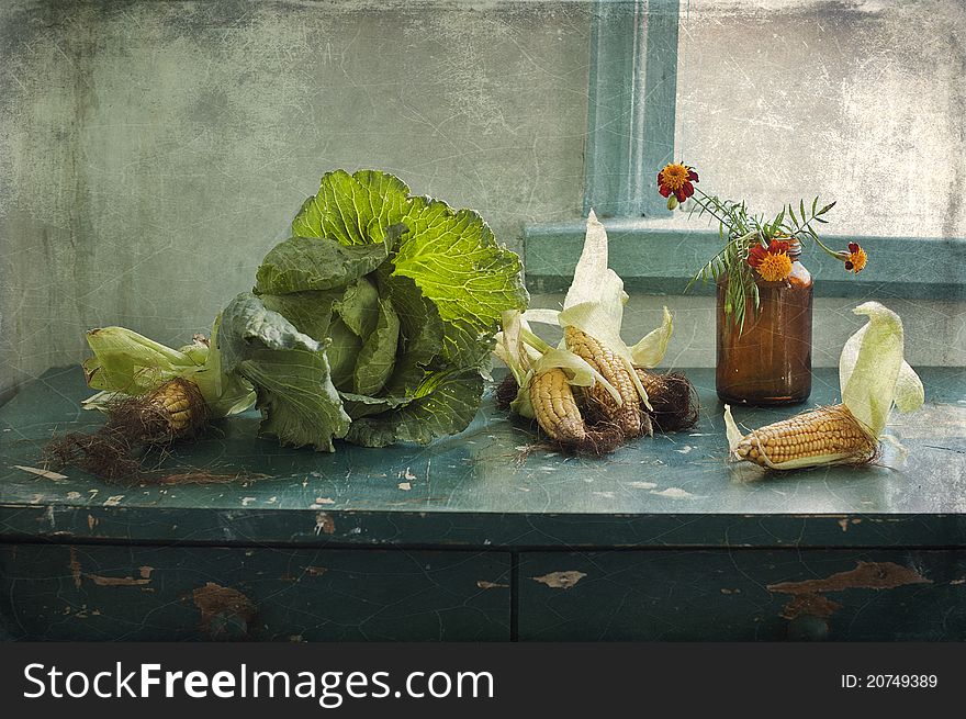 Still life with a gladiolus by a water-melon and pans. Still life with a gladiolus by a water-melon and pans