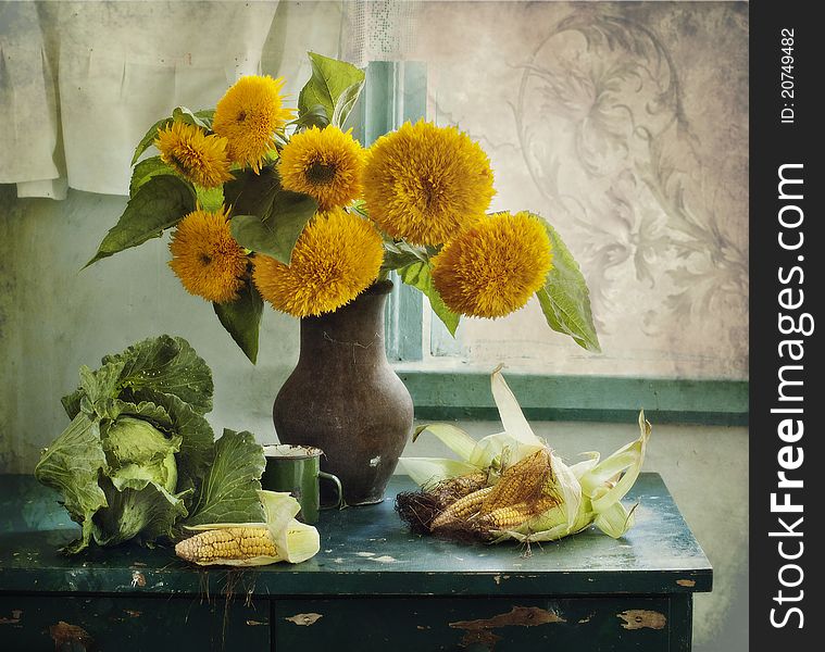 Still life with the bouquet of sunflowers, cabbage and corn. Still life with the bouquet of sunflowers, cabbage and corn