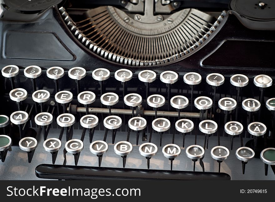 Black old typewriter in antique style