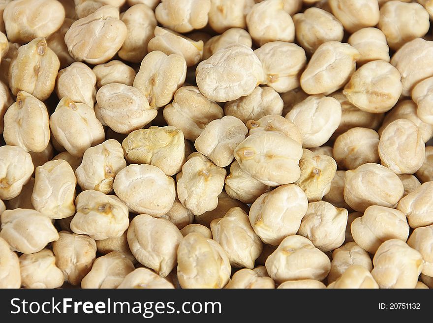 Fund of screen of a heap of chick-peas in tones beiges and with details in the textures