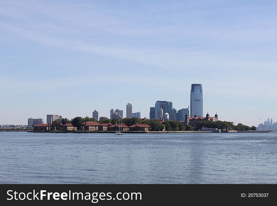 A view of Ellis Island and New Jersey Skyline in the background