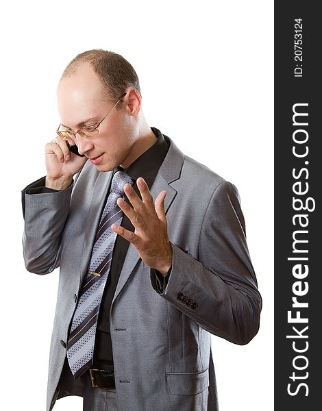 Man in a gray business suit, tie and glasses isolated on white background. Man in a gray business suit, tie and glasses isolated on white background