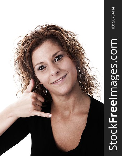 A young attractive woman making a call sign taken in a studio with a white background perfect for cutout.