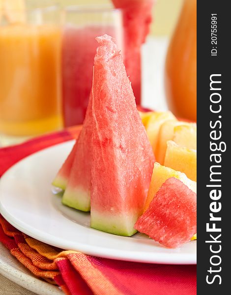 Watermelon and melon slices like salad in summer day. Watermelon and melon slices like salad in summer day