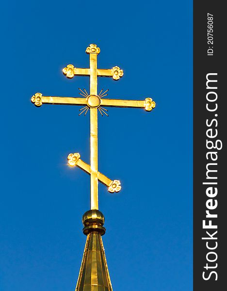 The church against the blue sky. Summer blue sky Orthodox Church