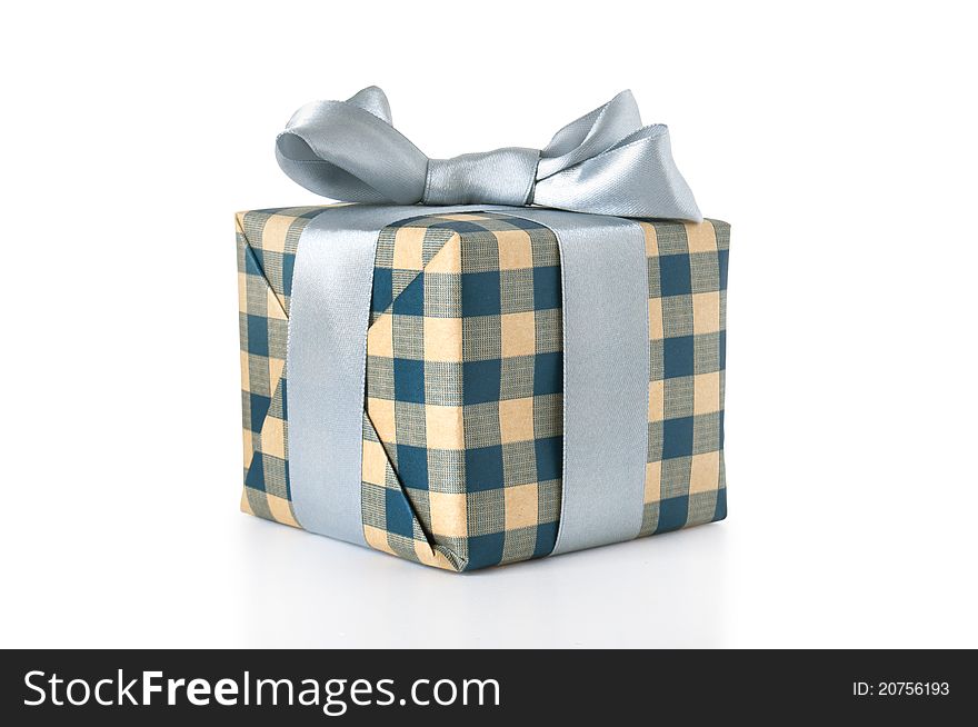 Gift box with silver ribbon on white background.
