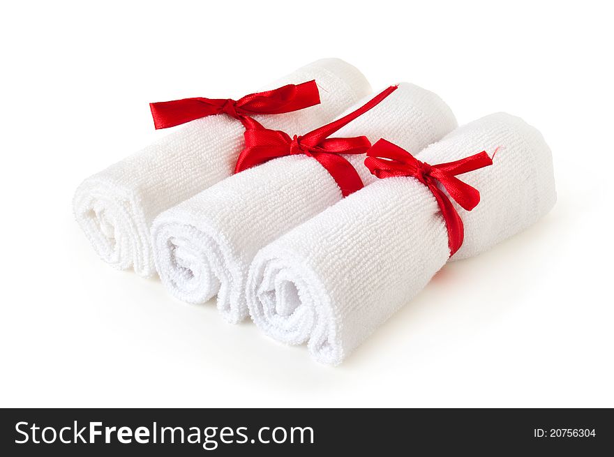 White towels with red ribbon