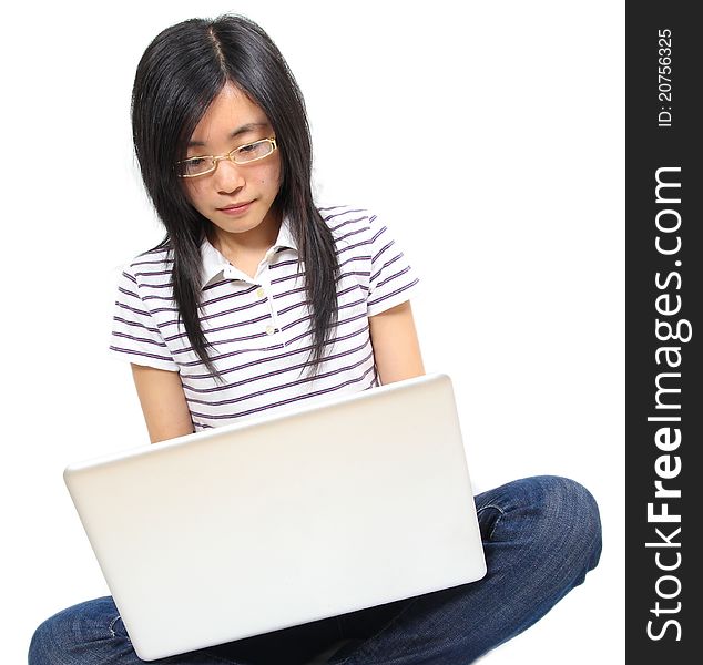 Young Chinese Woman Sitting On The Floor