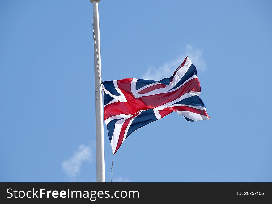 A British Union Jack Flag flying in a breeze