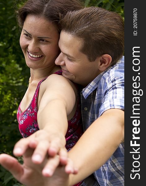 Very happy couple having fun in the park. Very happy couple having fun in the park.