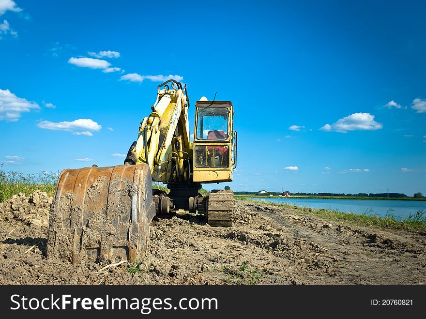 Digger, Heavy Duty construction equipment parked at work site