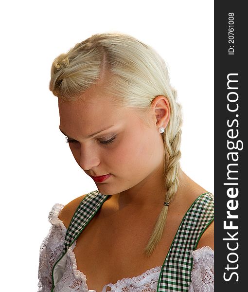 Young girl in dirndl praying. Young girl in dirndl praying