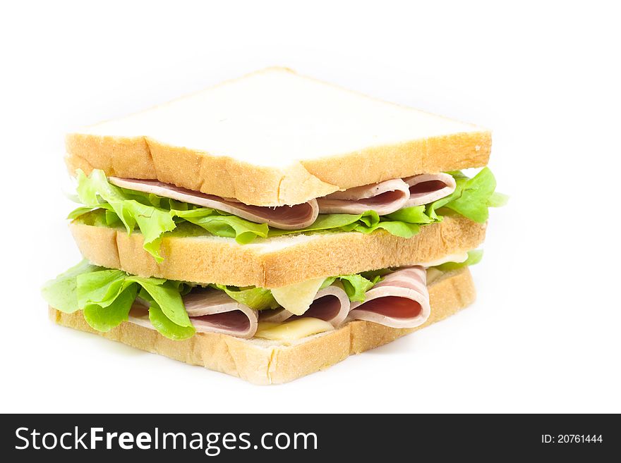 Ham and cheese sandwich on white background. Ham and cheese sandwich on white background