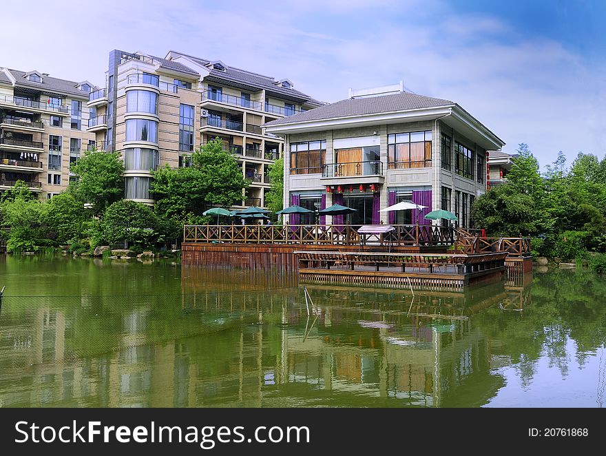 Landscape with house on lake