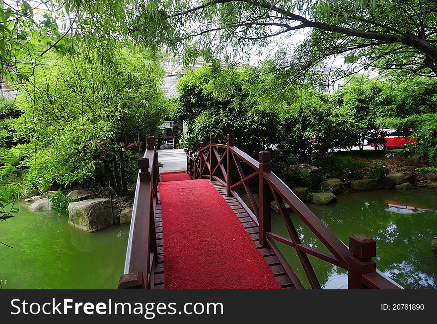 Asian beautiful garden with bridges tree. Asian beautiful garden with bridges tree