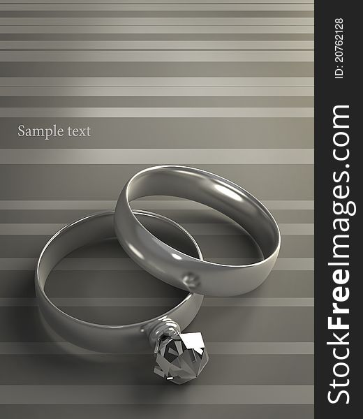 Wedding rings on grey background