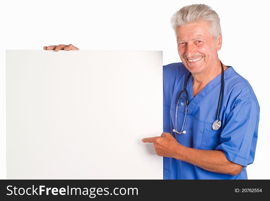 Cute doctor stands with board on white. Cute doctor stands with board on white